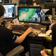 Two employees working at Riot Games